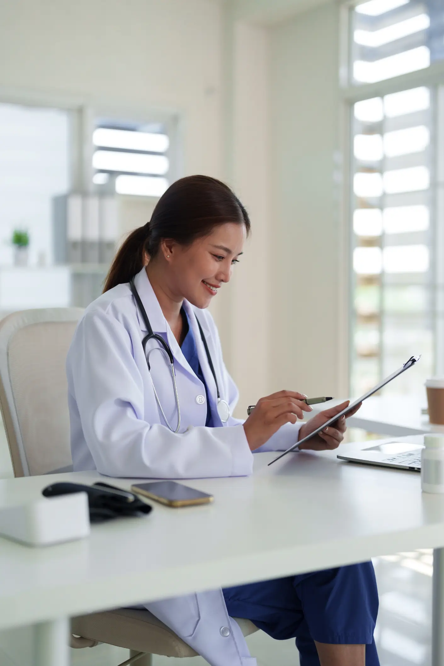 Licensed physician reviewing medical history